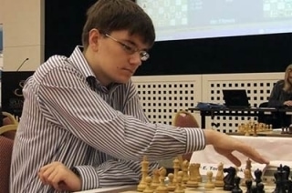 Евгений Томашевский сыграл первую ничью на чемпионате мира
