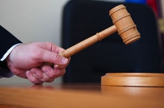Член ОПГ угрожал помощнику прокурора в зале суда