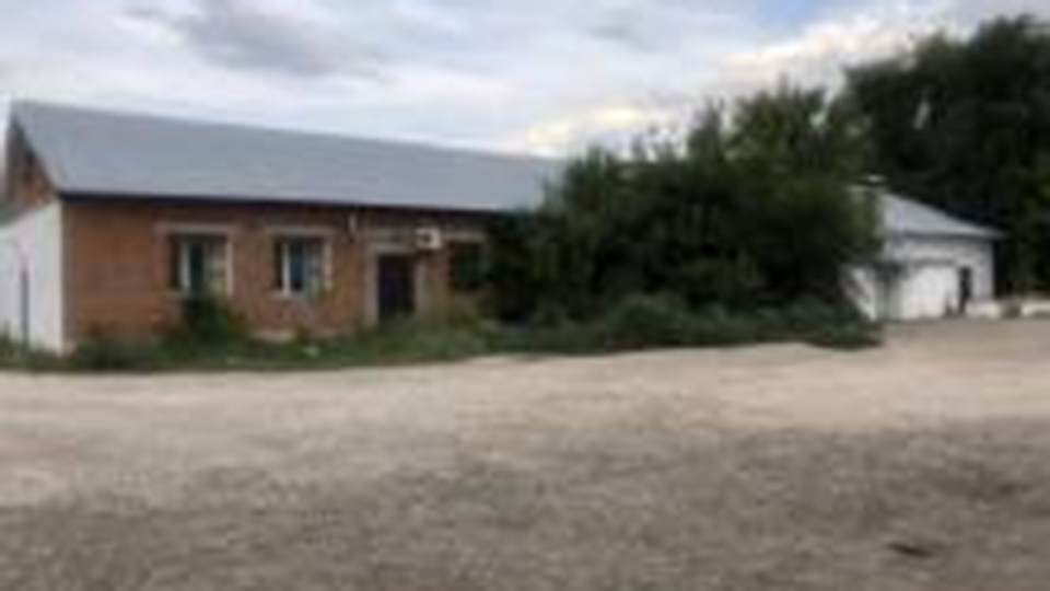 Бизнесвумен заплатила налоги после ареста бани, гаража и котельной